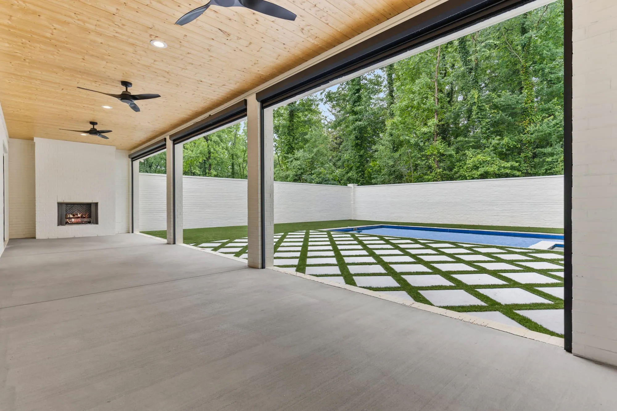 Covered outdoor living space of a Trivium Homes custom home